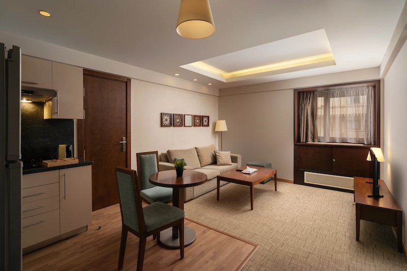 Family Suite living area at Iconia Zamalek Residences